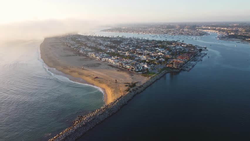 Balboa Peninsula Public Beach. Legendary Local Surf Spot "The Wedge." Newport, Orange County, Southern California Coast, USA. Corona Del Mar, Newport Bay Harbour Jetty.