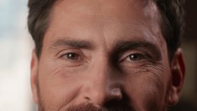 Close up cropped view male eyes wrinkles skin care dermatology good vision eyesight medicine health laser correction Caucasian middle-aged man business guy businessman smiling looking at camera face - Powered by Shutterstock - Get 15% off with code: PIKWIZARD15