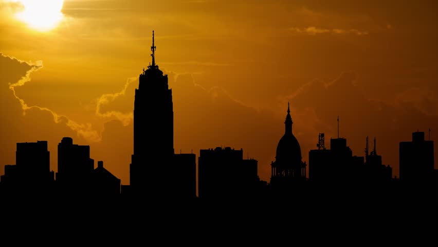 Michigan Panoramic Skyline of Lansing, Time Lapse at Sunset with Red Sun and Fiery Sky, USA