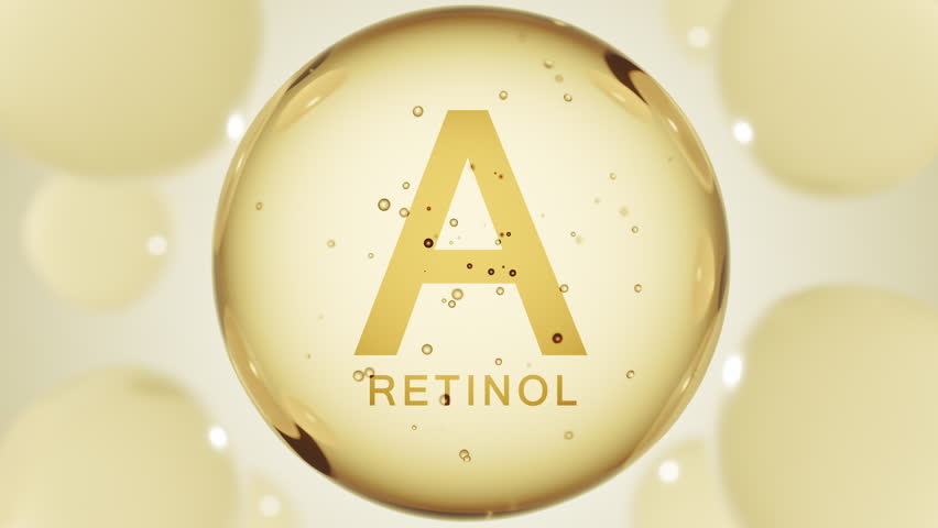 A golden glossy sphere representing Vitamin A Retinol. Dietary supplement. Medical or pharmacy concept