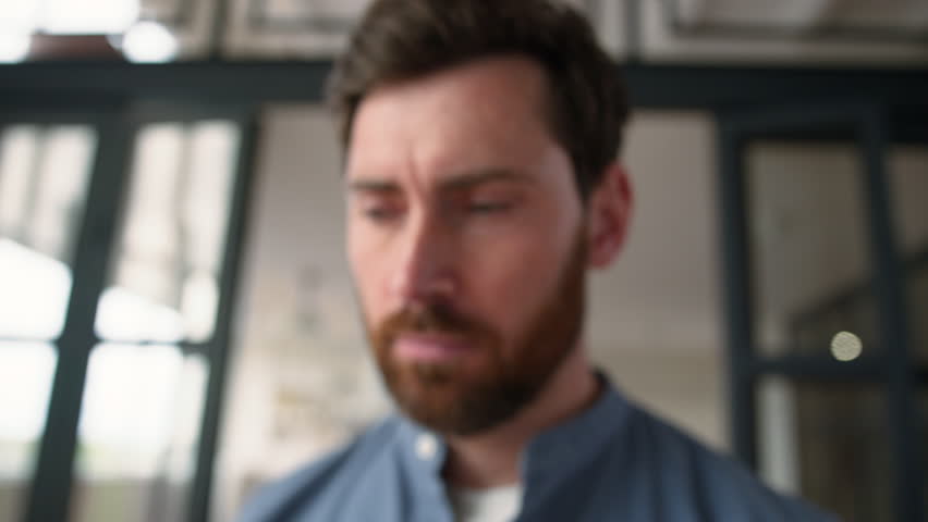 Frustrated Caucasian guy male man close up portrait pensive middle-aged parent looking at camera at home serious stressed thoughtful facial expression dad portrait mortgage problem adult father crisis