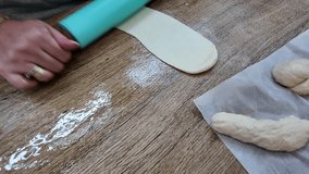 Preparing homemade bread rolls, showcasing dough kneading, shaping, and fresh golden-brown rolls baking in the oven, capturing the art of baking - Powered by Shutterstock - Get 15% off with code: PIKWIZARD15