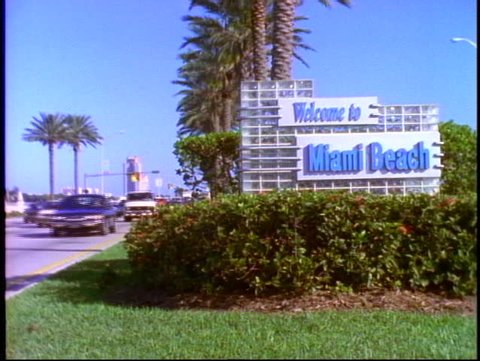 MIAMI, 1998, Welcome to Miami Beach sign, with traffic passing, medium wide