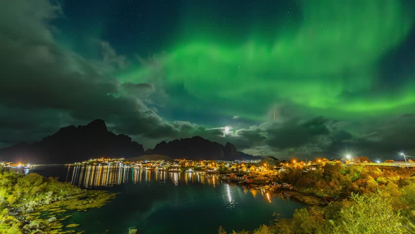 Northern lights dancing over Reine, Norway in a timelapse
