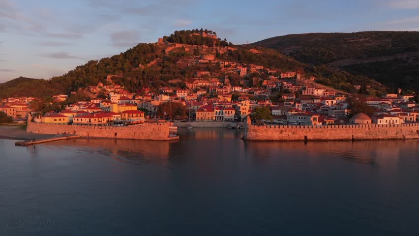 Aerial view of Naupactus with the Venetian Port and Venetian Castle at sunrise, Nafpaktos, Greece.