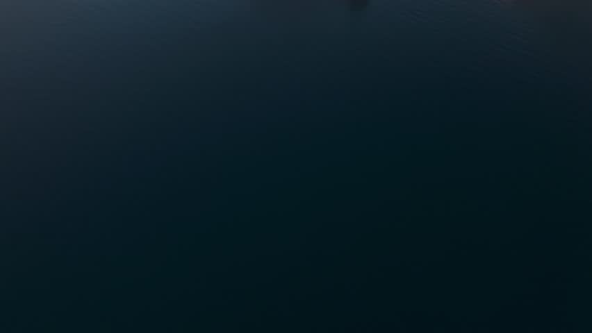 Aerial view of Nafpaktos Venetian Port at sunrise with beautiful medieval fortress and charming coastal town, Nafpaktos, Greece.