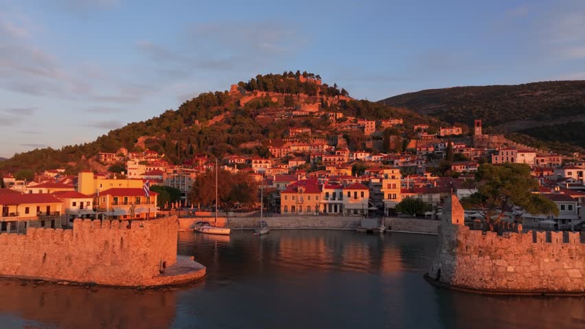 Aerial view of Nafpaktos Venetian Port at sunrise with the Venetian Castle of Nafpaktos, Nafpaktos, Greece.