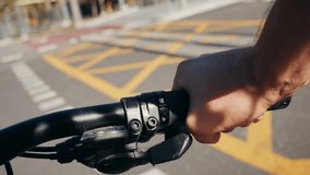 Pov riding bicycle bike, point of view closeup of a hand on a bicycle handle a sunny day, highlighting the joy of cycling in spain, barcelona - Powered by Shutterstock - Get 15% off with code: PIKWIZARD15