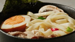 Japanese Ramen with Beef or chicken, rice noodles with fried meat, Tom Yam kung Spicy Thai asian soup, chef cooking in traditional korean chinese food. Close up of tasty korean cuisine.  - Powered by Shutterstock - Get 15% off with code: PIKWIZARD15