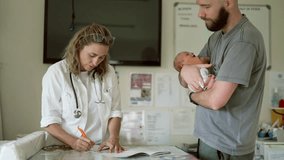 Doctor, baby and father with woman writing in hospital for healthcare service, check up or wellness. Pediatrician notebook, child and dad consulting with medical professional for clinic prescription. - Powered by Shutterstock - Get 15% off with code: PIKWIZARD15
