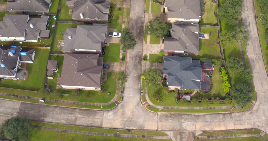 Birds eye view of suburban homes and neighborhood in Missouri City, Texas just outside of Houston