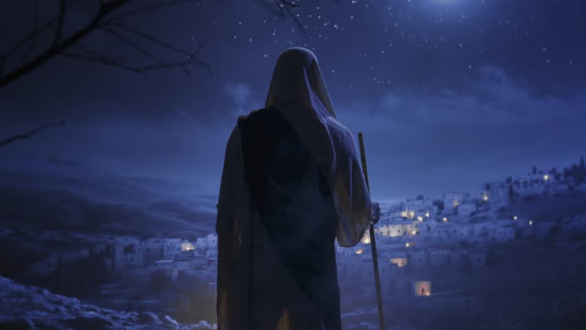 Hooded Figure Overlooks Ancient City At Night Middle Eastern Village Spiritual Journey