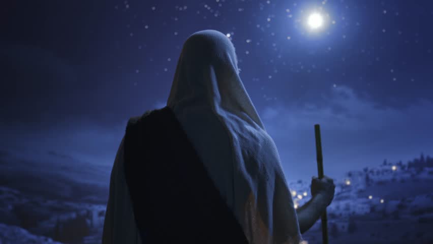 Mysterious Hooded Figure Overlooking Ancient City At Night Spiritual Journey