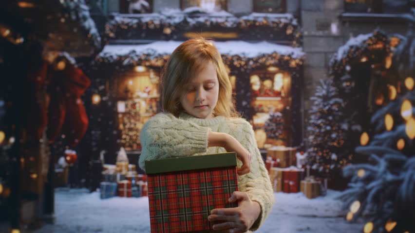 Magical Christmas Present Opening In Winter Snow Outside Store Holiday Wonder