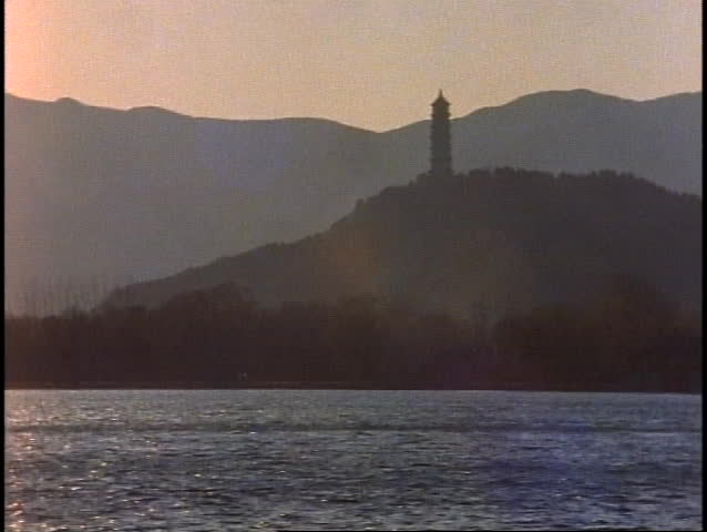 CHINA, 1999, Beijing, Near the Summer Palace. Lake, Pagoda, Mountains, Backlighting, wide shot, classic Chinese country scene