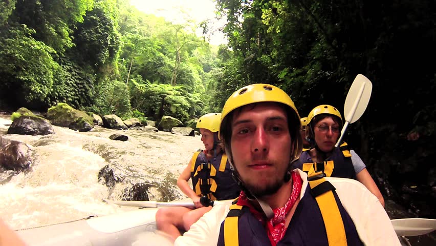 BALI JANUARY 1: Tourists white water rafting in Ayung River, on January 5, 2013