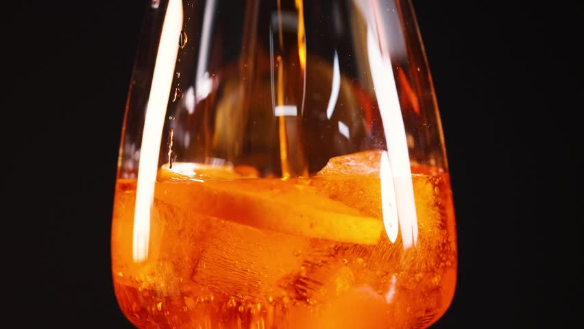Close-up of Aperol Spritz with ice cubes