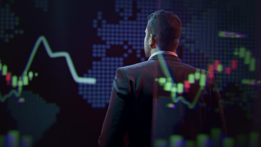 Businessman Analyzing Financial Market Data Charts Technology Investment Trading Success - Powered by Shutterstock - Get 15% off with code: PIKWIZARD15