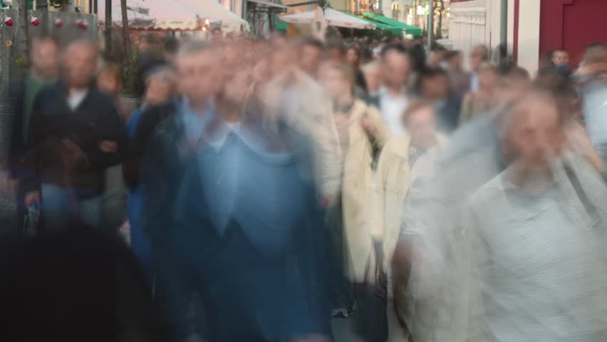People crowd walk city street time lapse. Lots of busy pedestrians hurry up home, work timelapse. Metropolis rush hour. Life transience concept. Fast urban road. Many citizen run, stroll public place.