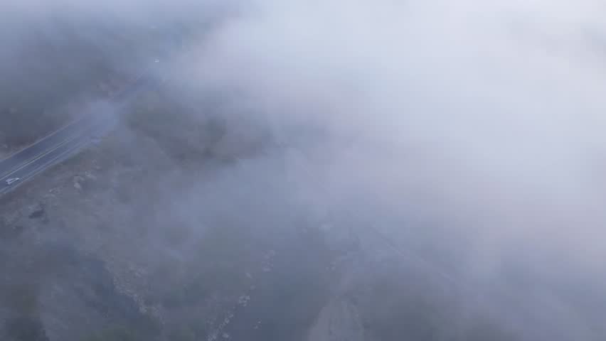 Aerial view of railway bridge over foggy varbitsa river at sunrise, Balabanovo, Bulgaria.