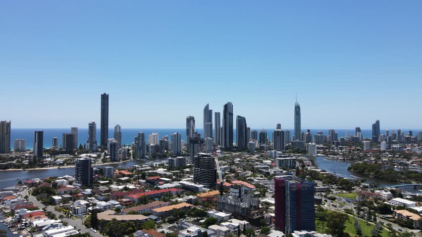 Gold Coast suburb of Chevron Island and the towering buildings of Surfers Paradise and Broadbeach. Moving drone view