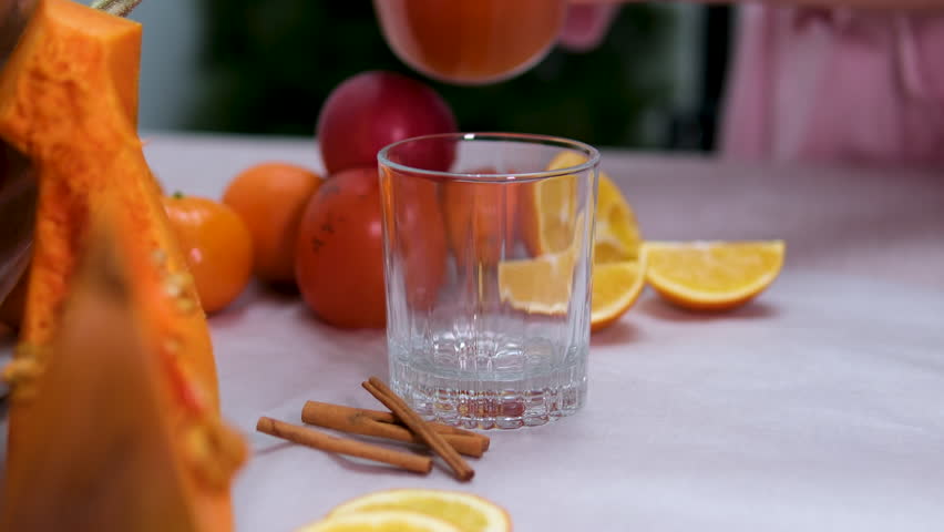 pumpkin juice Autumn Cocktail with Pumpkin, Orange and Cinnamon