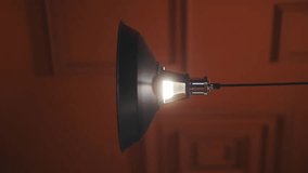 metal lampshade close up. Metal chandelier in the interior. Retro style lamp with large lampshade. Close-up. vertical video - Powered by Shutterstock - Get 15% off with code: PIKWIZARD15