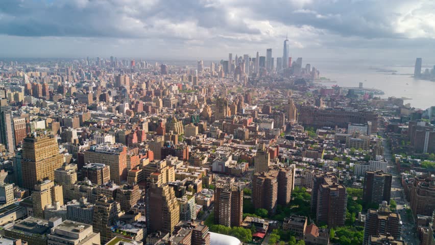 NEW YORK, USA - JANUARY 5, 2025: Aerial view showcases the vibrant cityscape and iconic skyline of New York during a cloudy day
