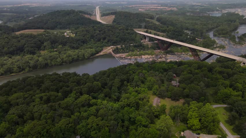 Bridge over the Shenandoah River. Dense green forest. View from above.