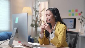 Young telemarketer is experiencing growing frustration and stress while working on her computer - Powered by Shutterstock - Get 15% off with code: PIKWIZARD15