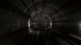 Back cabin view of driverless metro train moving through underground tunnel. Automated advanced transportation system, subway. High quality 4k footage - Powered by Shutterstock - Get 15% off with code: PIKWIZARD15