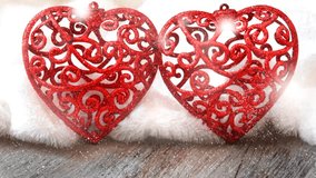 Two red hearts on white fluffy background, animated snowfall and blinking lights, love , Valentines day, birthday and wedding concept, falling in love - Powered by Shutterstock - Get 15% off with code: PIKWIZARD15