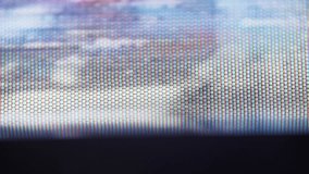 A close-up of a retro CRT television screen displaying flickering glitchy video, accompanied by static noise, creating a distorted and nostalgic effect - Powered by Shutterstock - Get 15% off with code: PIKWIZARD15