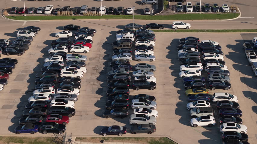 Aerial top down shot of many car on parking lot