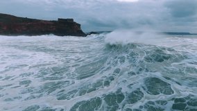 Towering Ocean Wave with Coastal Cliffs in the Distance - Powered by Shutterstock - Get 15% off with code: PIKWIZARD15