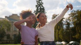 School education Indian African multiethnic little girls students pupils schoolgirls outdoor gadget addict mobile phone posing photo female children friends sisters teen bloggers kids selfie blog vlog - Powered by Shutterstock - Get 15% off with code: PIKWIZARD15