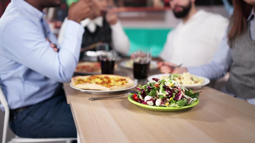 People Having Funh At Street Food Event. Local City Dining