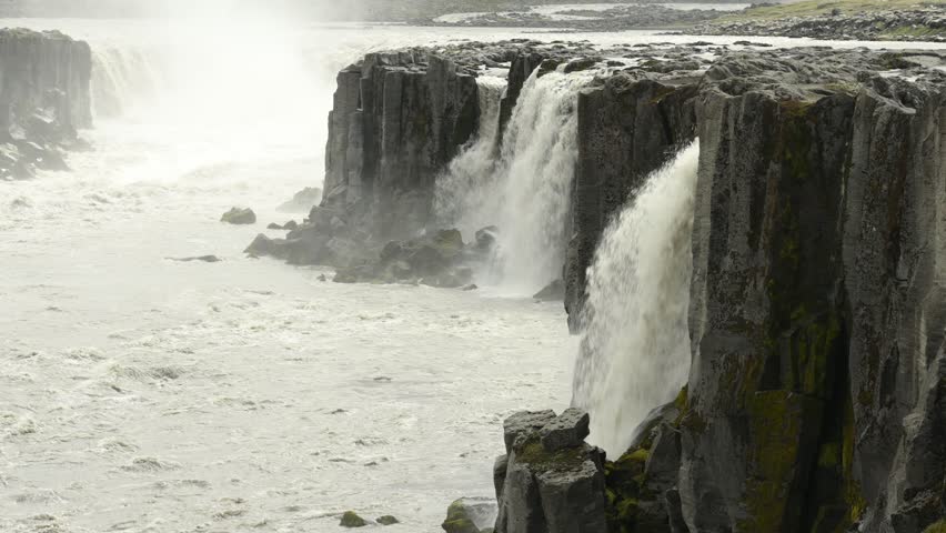 Powerful waterfall in Iceland. Powerfull destructive nature