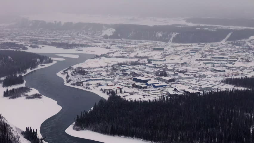 Monochrome View Of Whitehorse Town During Winter In Yukon, Canada. Aerial Drone Shot