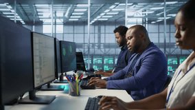 Surprised data center technician celebrating after successfully managing to install cybersecurity framework, reducing security incidents and enhancing data protection protocols, camera A - Powered by Shutterstock - Get 15% off with code: PIKWIZARD15