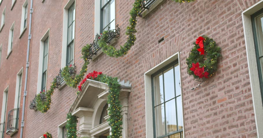 The christmas decoration on a brick wall of a house in Dublin, Ireland.