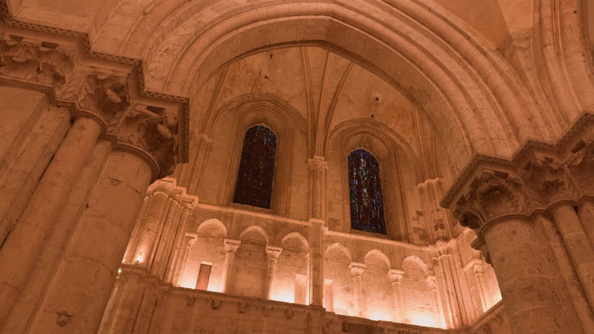 A stunning view of Gothic arches and stained glass in Saint-Nicolas Church, Blois