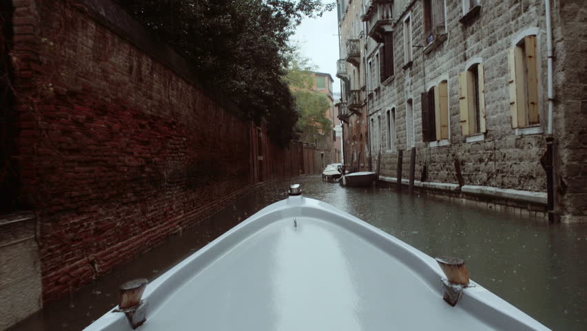 Crossing the canals of venice on a boat. Venice - Italy