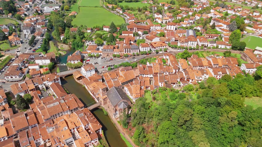 Scenic view of a picturesque French town Saint-Jean-Pied-de-Port with a tranquil river, Pyrenees-Atlantiques department in south-western France. Basque country. The Most Beautiful Villages of France