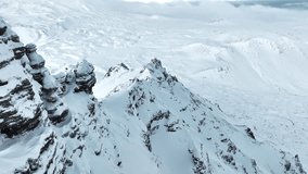 Steep peak covered in snow, Snowy mountain range, Aerial view nature landscape in Iceland, Epic panorama, Nature summit - Powered by Shutterstock - Get 15% off with code: PIKWIZARD15
