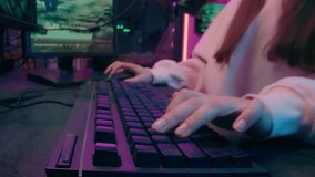 Close up hands typing computer keyboard joyful Caucasian female host blogger streamer discuss gamer speak mic addict influencer girl playing digital game tech blog at home happy woman cyber sport neon - Powered by Shutterstock - Get 15% off with code: PIKWIZARD15