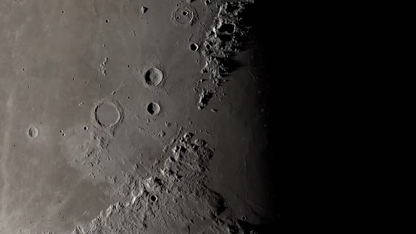 High-resolution image of the lunar surface, showcasing Archimedes crater, 83 km in diameter, the appenninus, and varied terrain in Mare Imbrium. 4k.