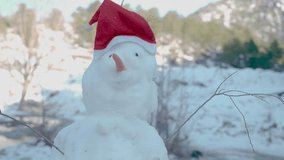 snowman in winter close-up on the background of snow - Powered by Shutterstock - Get 15% off with code: PIKWIZARD15