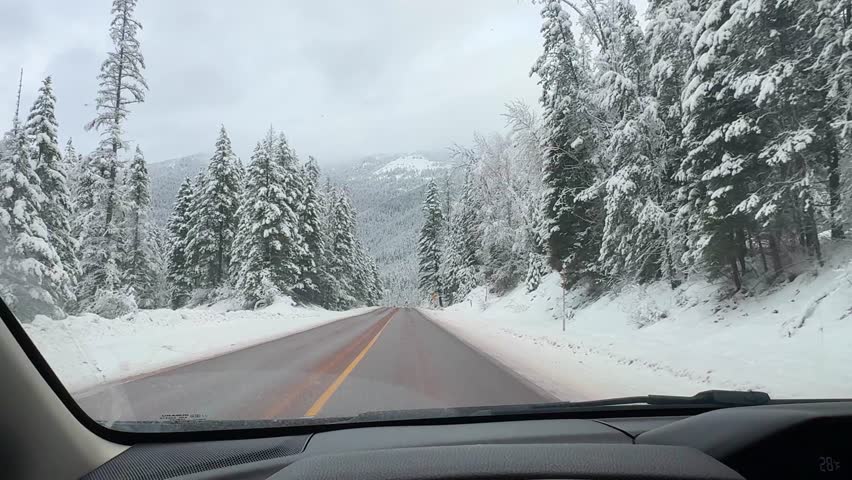 POV Winter Drive Glacier National Park Snowy Icy Roads Montana