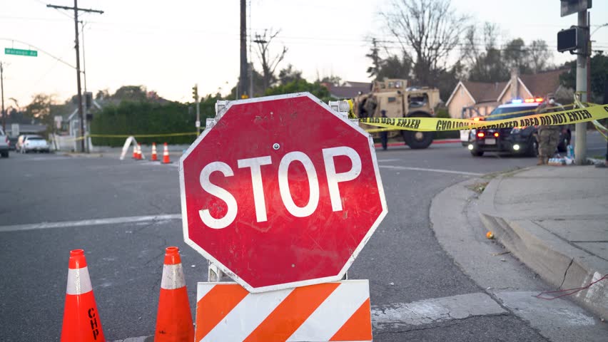 "Stop Sign and Barricade During Road Closure in Pasadena, California